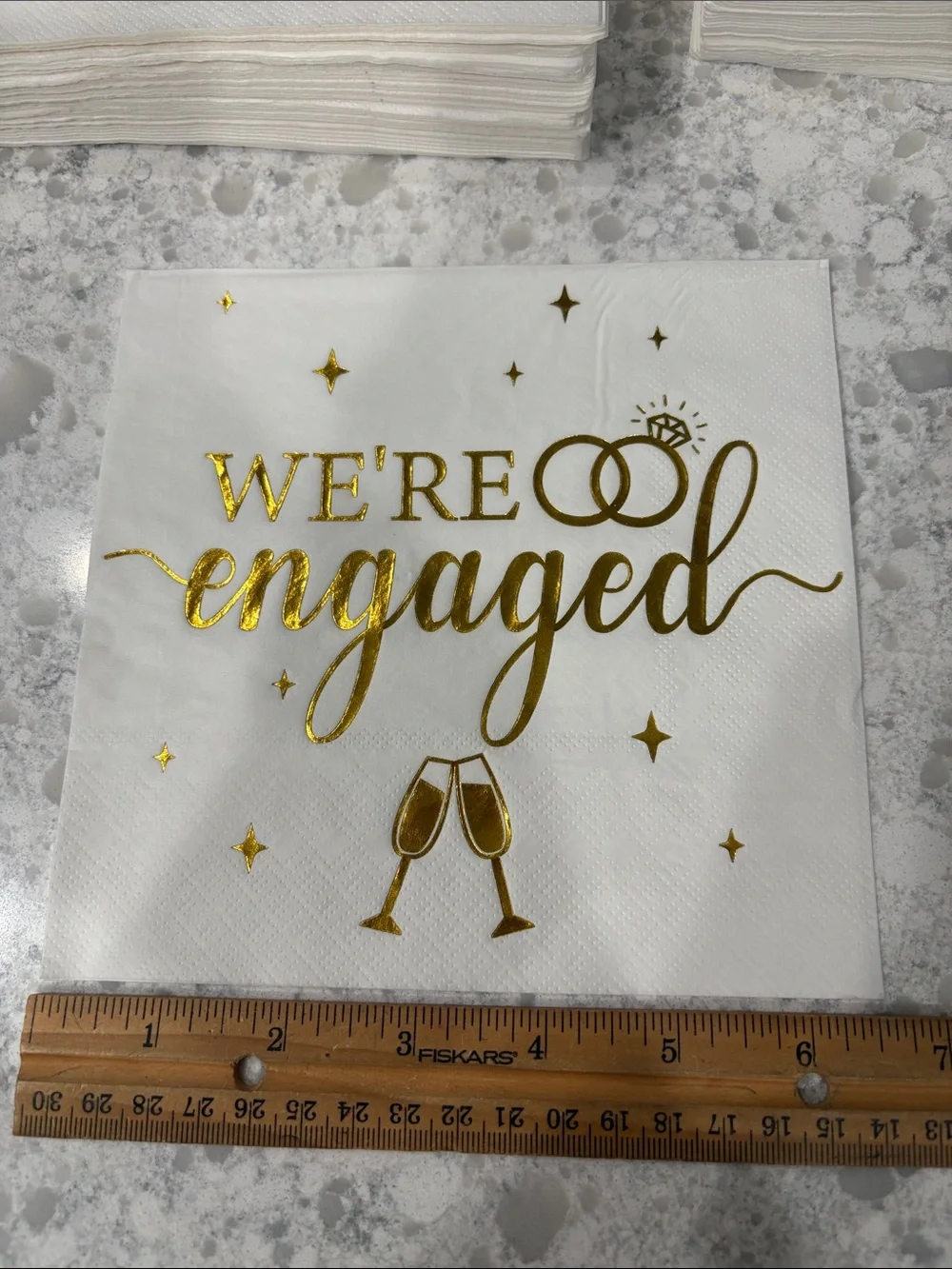 New set of 75 “We’re Engaged” gold foil print 6.5” x 6.5” white napkins 3-ply